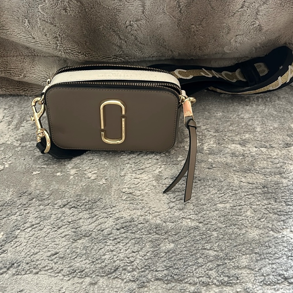 Marc Jacobs camera bag with guitar strap. Mint condition. Used a few times